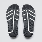 Black and white sole pattern on a gray background