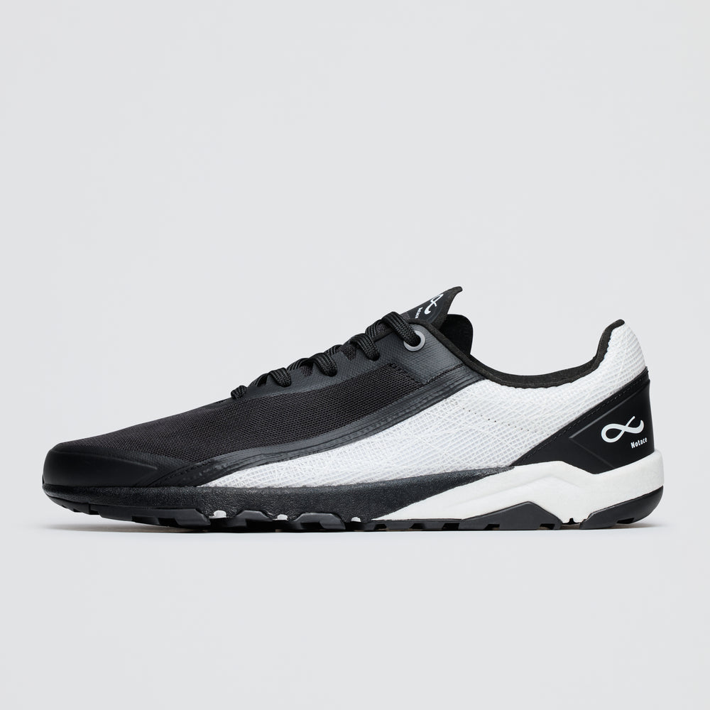 Black and white sneaker on a light gray background