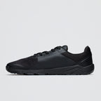 Black athletic shoe on a light gray background