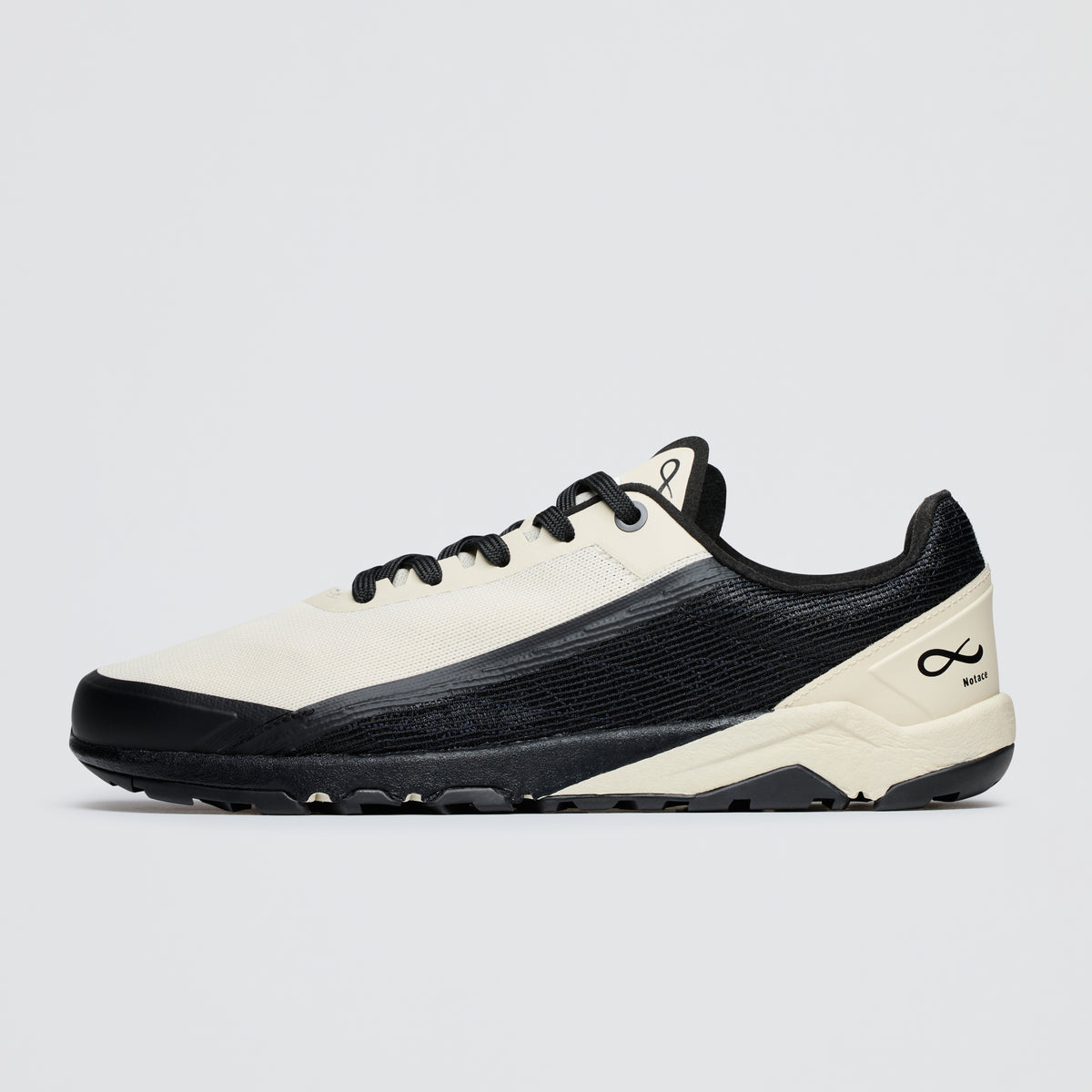 Black and white sneaker on a light gray background